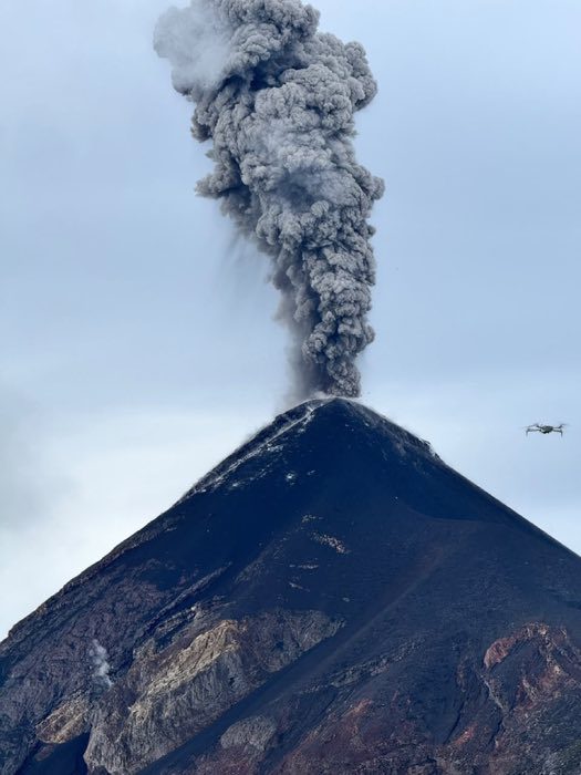 Volcan de Fuego erupting in Guatemala, seen from a neighbouring summit